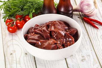 Raw chicken liver uncooked in the bowl