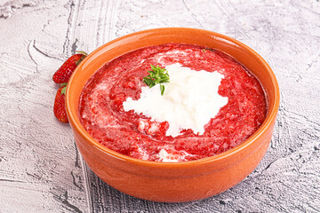 Strawberry soup with strachatella cheese