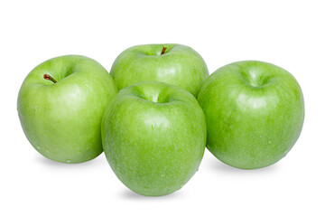 Four green apples with water drops isolated