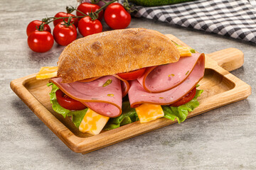 Sandwich ciabatta with mortadella and cheese
