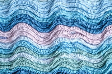 Wavy Knitted Texture in Pastel Blue and Pink Shades A Soft and Cozy Fabric Background