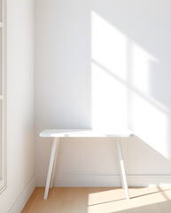 Fototapeta premium A bright, minimalist all-white interior space with a simple table and natural sunlight.