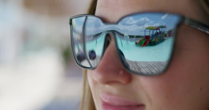 Reflection of Water Park in Sunglasses