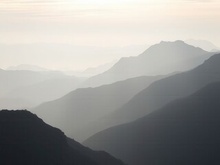 Fototapeta premium Misty Mountain Range at Sunrise