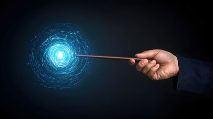 Fototapeta premium Magical Hand with Wand Creating Light in Dark Background