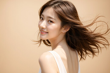 Headshot of a woman with her hair blowing softly in the wind as she turns around, AI-generated