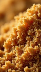 Close-up of coarse brown sugar crystals, textured background , golden, surface, uneven