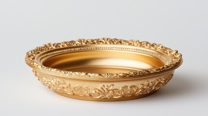 Elegant golden bowl with floral ornaments on white background. Decorative bowl for home decor.