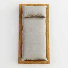 Top view of a cozy, minimalist bed with a textured gray mattress and a wooden frame, for modern interior designs.