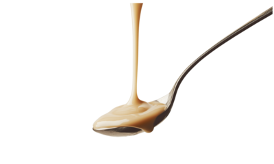 spoon of sweetened condensed milk