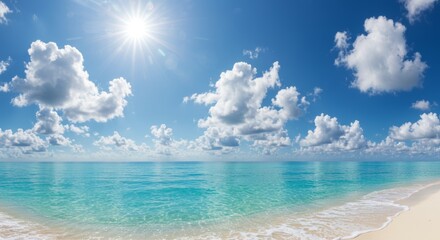 Obraz premium Idyllic tropical beach scene with turquoise sea and brilliant blue sky