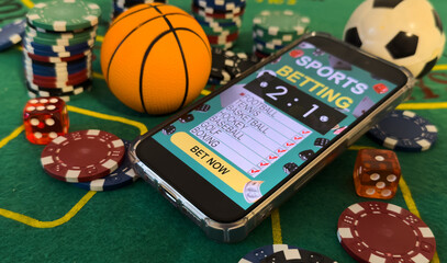 Money, mobile phone. Concept of sports bet.