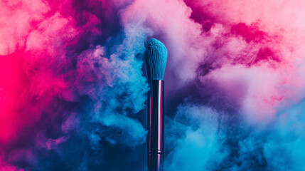 A vibrant makeup brush emerges from colorful smoke, showcasing a blend of pink and blue hues, symbolizing creativity and artistry.