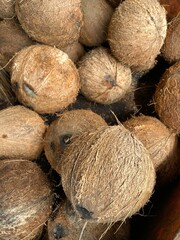coconut shells that have been peeled and ready to be sold in traditional markets. Indonesia, Asia