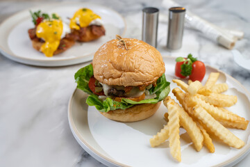 Modern diner food photography burger and fries in a cozy atmosphere