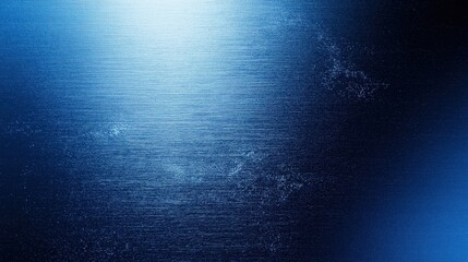 Obraz premium A deep blue brushed metallic surface with soft light reflections, creating a modern and high-tech digital background