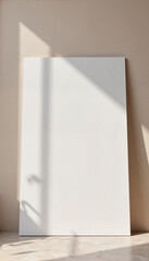 Sleek blank flyer showcasing minimalist design against neutral wall, branding concept
