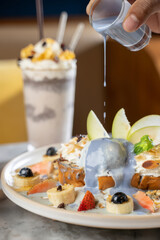 Indulge in colorful ice cream dessert, cozy , food photography, bright atmosphere, close-up delight