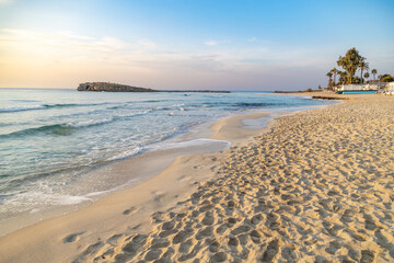 Peace and quiet on the morning beach with white sand and turquoise water. Low season. Nissi Beach, Cyprus, Mediterranean.  © Vlad Rakin