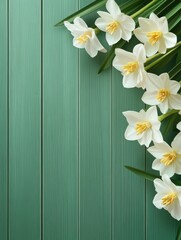 Obraz premium spring flowers on green wooden background