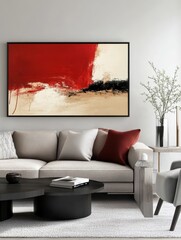 An abstract painting is hanging on the wall above the couch