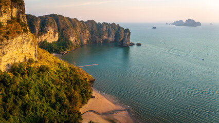 aerial view of Krabi limestone seascape at sunset revealing Ao Nang resort town