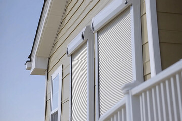 Home features automated storm shutters for enhanced protection against severe weather events and natural disasters