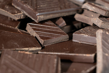 Delicious dark chocolate segments, rich black chocolate texture