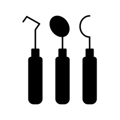 Dental tools glyph icon