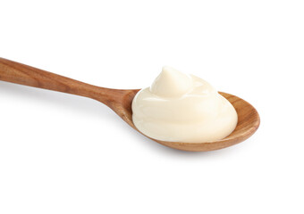 Tasty mayonnaise sauce in wooden spoon isolated on white