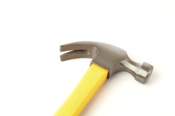 Hammer With a Yellow Handle Resting on an Isolated White Background