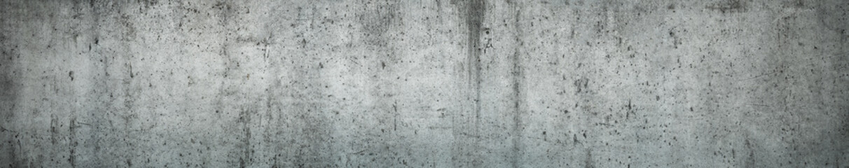 Textured Concrete Wall: A detailed texture of a weathered, rough concrete wall, displaying various shades of gray with visible imperfections, evoking a sense of age, industrial aesthetic.