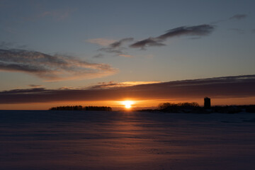 Sunrise over snow field in Hokkaido japan
