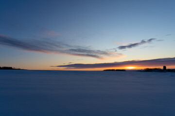 Sunrise over snow field in Hokkaido japan