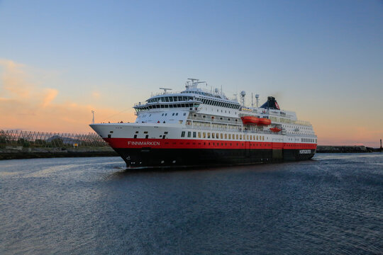 The coastal route ship Ms Finnmarken. (Has changed name to Otto Sverdrup) Arriving at Svolv&aelig;r harbor at sunset