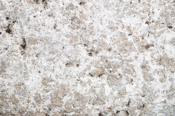 Light cracked wall. Minimalistic soft wall texture with cracked details.