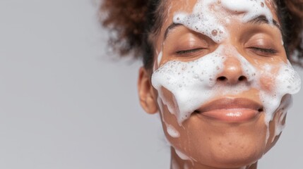 Fototapeta premium Woman using face wash