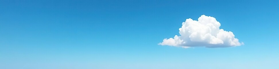 Naklejka premium A solitary cloud hovering above a vast, empty blue sky, isolated, landscape