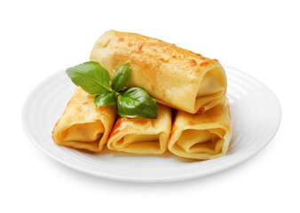 Delicious rolled crepes with basil isolated on white