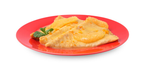 Plate with tasty crepes Suzette isolated on white