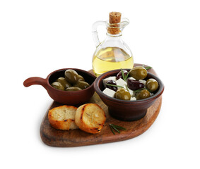 Marinated olives, feta cheese, bread pieces and oil isolated on white