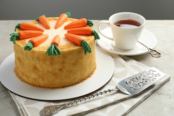 Delicious homemade carrot cake served on light grey table