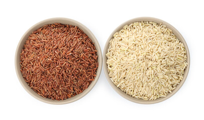 Different sorts of raw brown rice isolated on white, top view