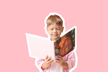 Cute little boy reading book on pink background