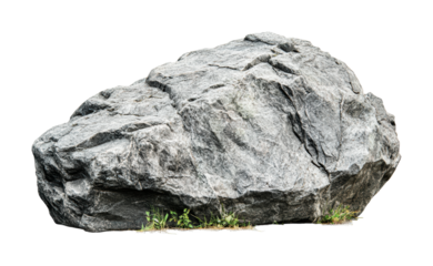 Natural stone formation with rugged texture and sparse vegetation at the base for design and artistic purposes, cut out