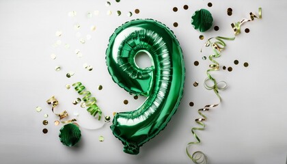 Green balloon number 9 for ninth birthday or anniversary party. White background with confetti