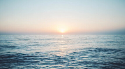 Obraz premium Peaceful Seascape with Gentle Ocean Waves and Soft Light of the Rising Sun, Creating a Soothing and Reflective Atmosphere.