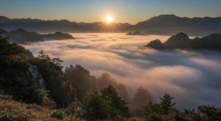 Obraz premium Sunrise Golden Mountain Above Sea of Clouds