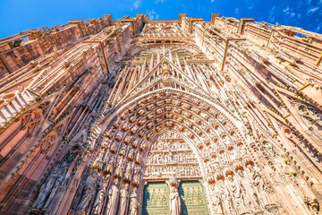Spectacular portal architecture and front facade of Strasbourg cathedral of Notre Dame