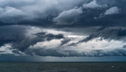 Obraz premium Moody overcast sky background, fleecy clouds texture, ominous skies in cold windy weather